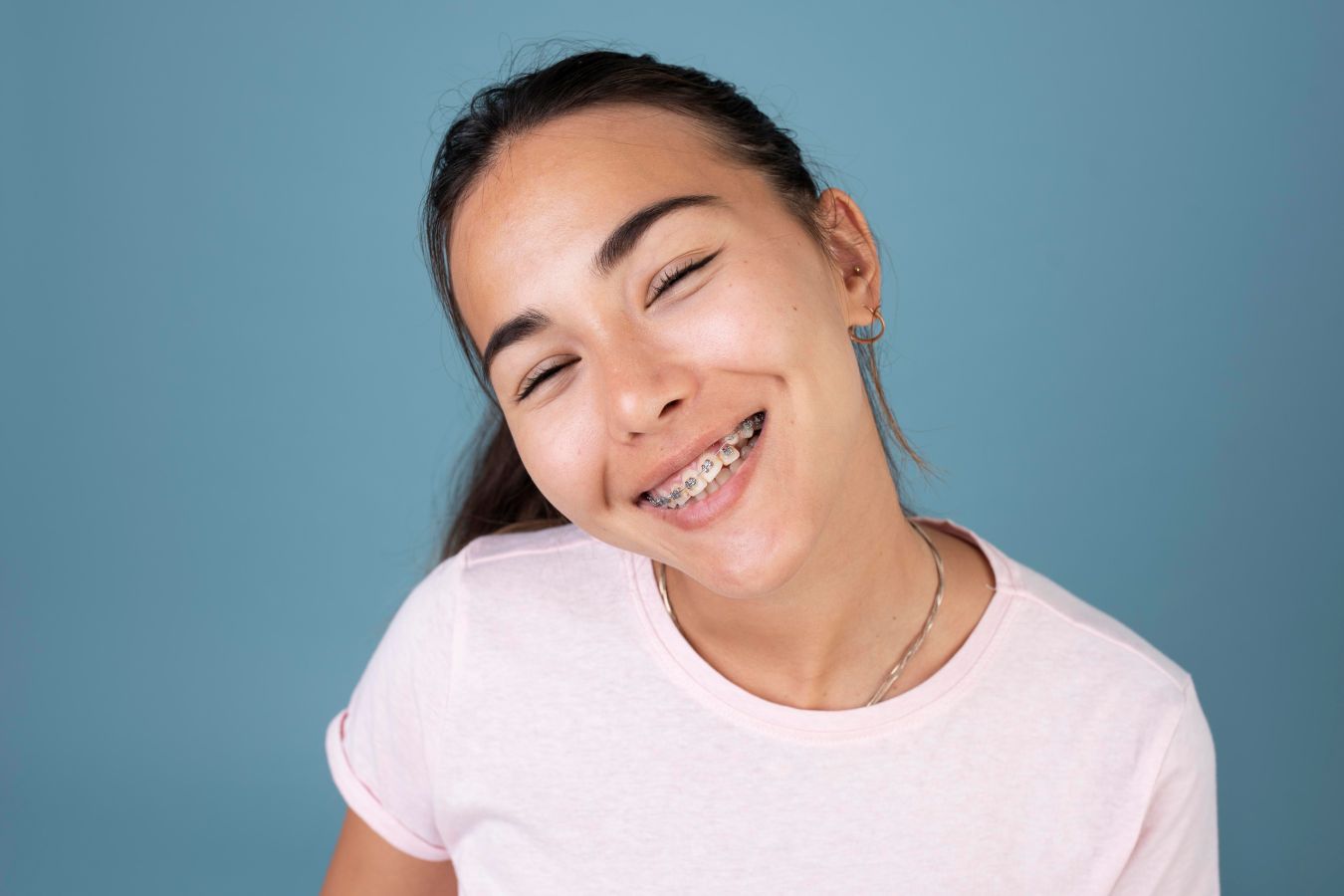 Teenage patient with traditional braces at Gamblin Orthodontics